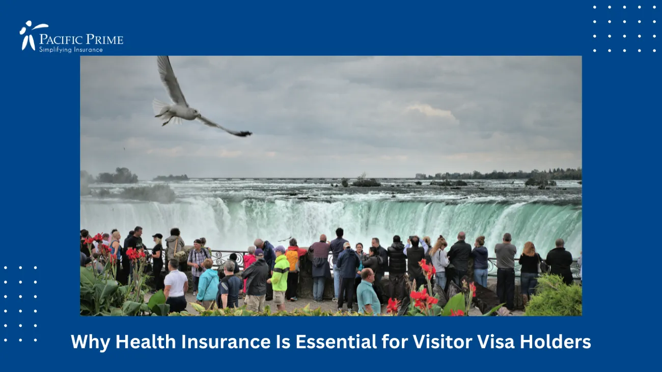 Image of People Photographing Niagara Falls Under A Cloudy Sky with text overlay of "Why Health Insurance Is Essential for Visitor Visa Holders"