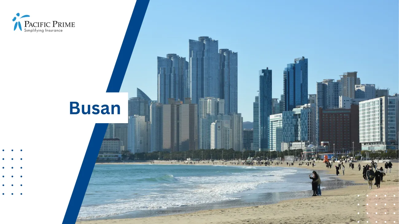 Image of People Strolling Along Busan Oceanfront, South Korea with text overlay of "Busan"