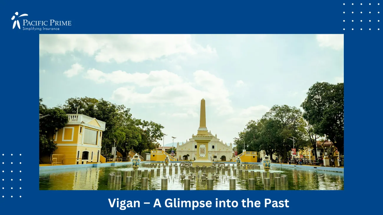 Image of People Strolling In A Park In Vigan City, Philippines During Daytime with text overlay of "Vigan – A Glimpse into the Past"