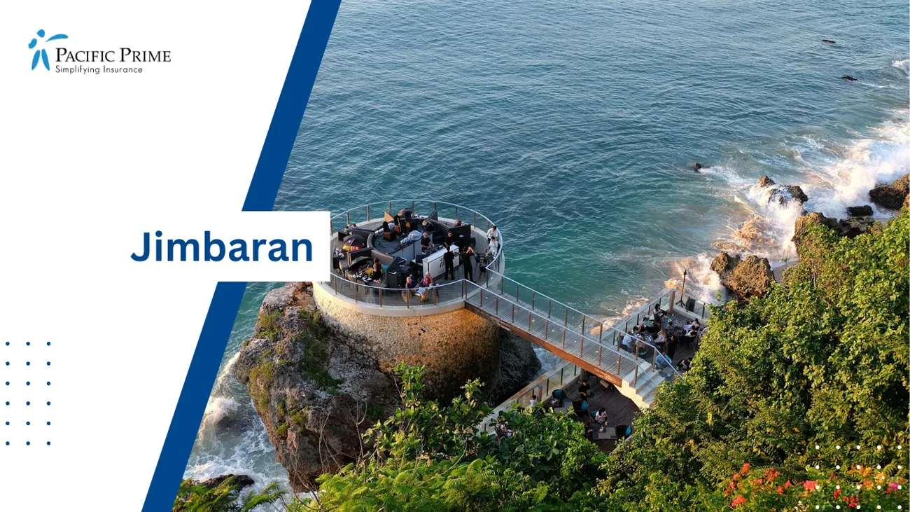 Image of People Strolling On A Gray Bridge Over The Blue Sea At Ayana Resort, Jimbaran, Bali with text overlay of "Jimbaran"