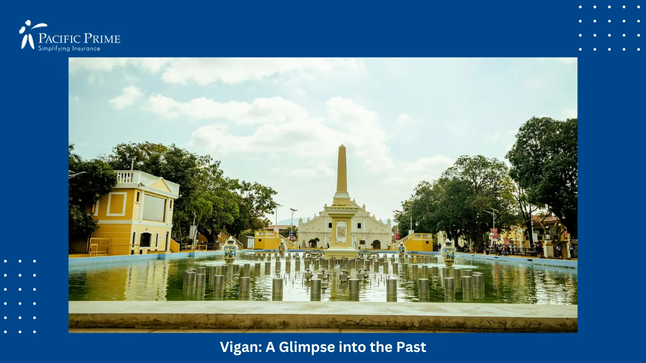 Image of People Strolling Through A Park In Vigan City, Philippines During Daytime with text overlay of "Vigan: A Glimpse into the Past"