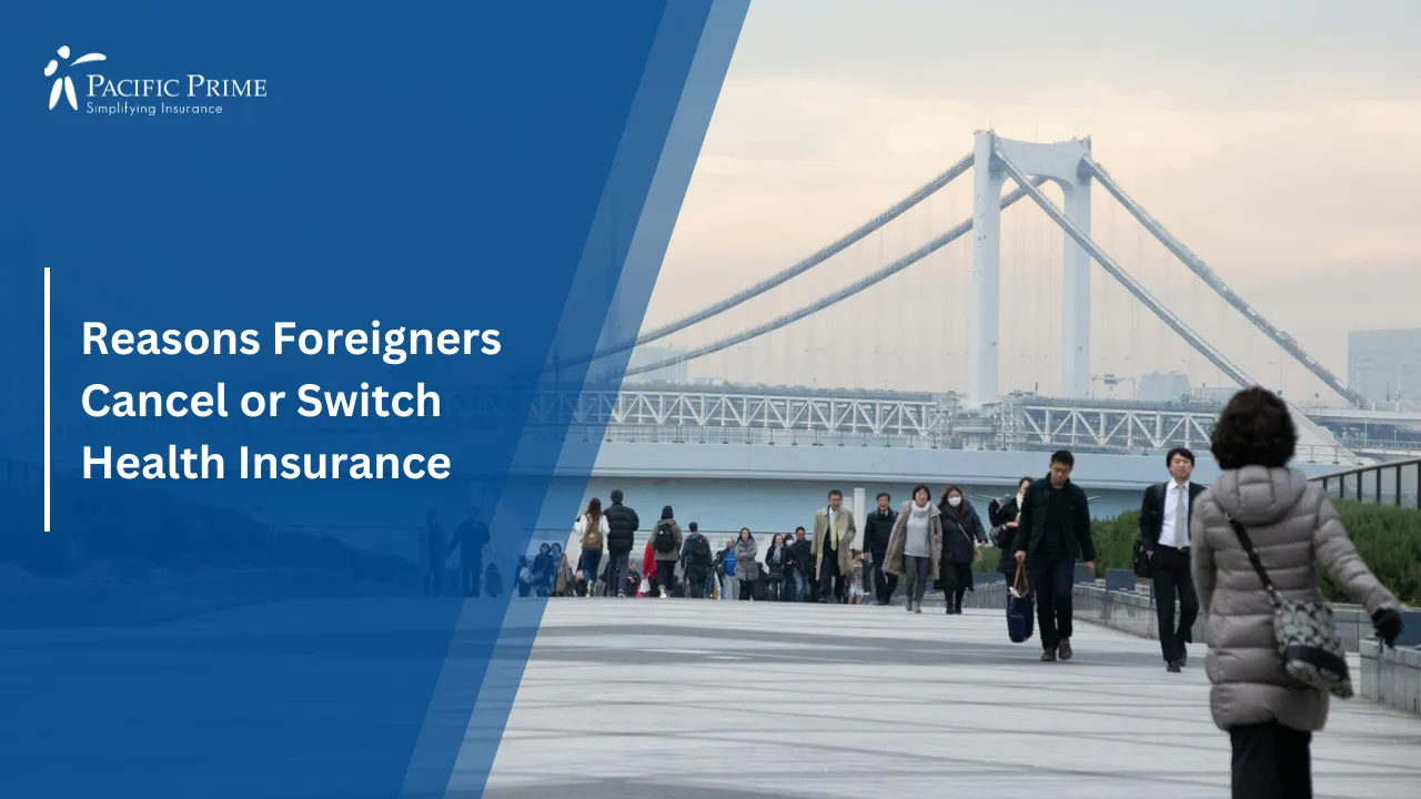 Image of People Walking Across Tokyo&rsquo;s Rainbow Bridge With City Views with text overlay of "Reasons Foreigners Cancel or Switch Health Insurance"