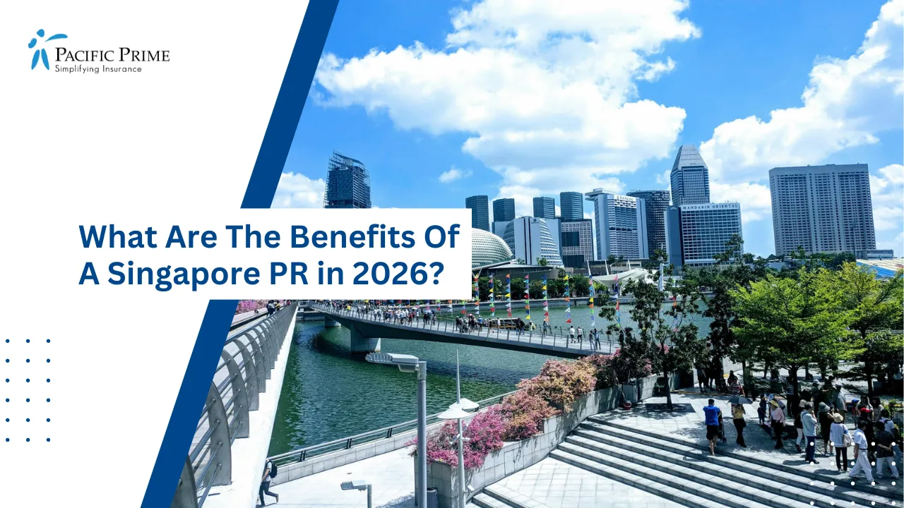 Image of People Walking Along The Waterfront Near Merlion Park In Singapore with text overlay of "What Are The Benefits Of A Singapore PR in 2026?"