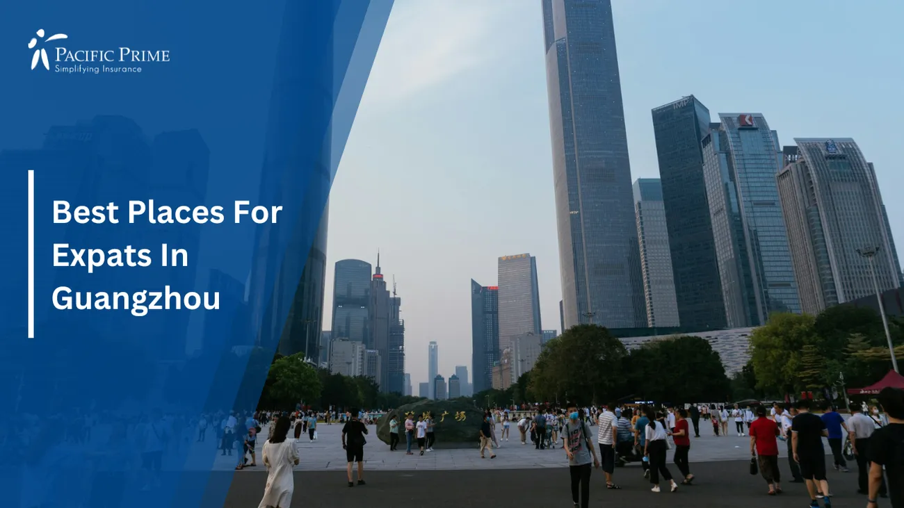 Image of People Walking In A Park With High-rise Buildings In Guangzhou with text overlay of "Best Places For Expats In Guangzhou"