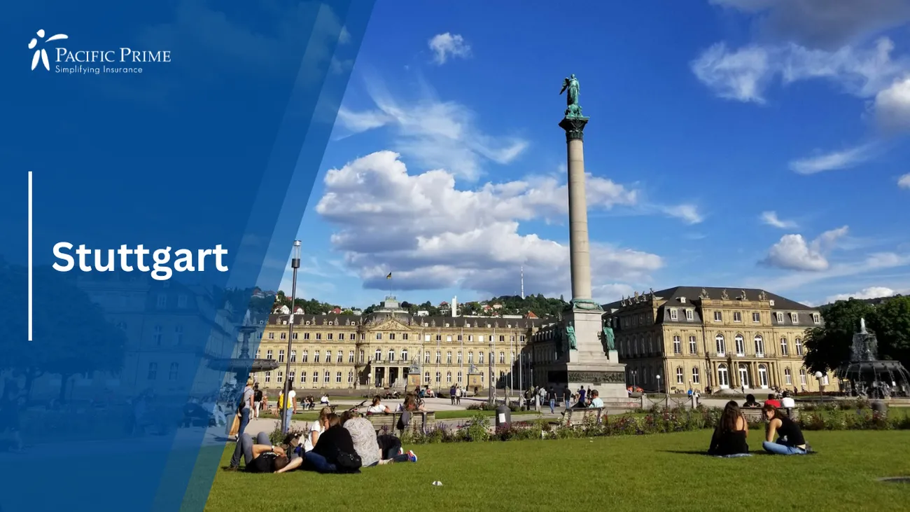 Image of People Walking On Grass Near The Old Palace In Stuttgart, Germany with text overlay of "Stuttgart"