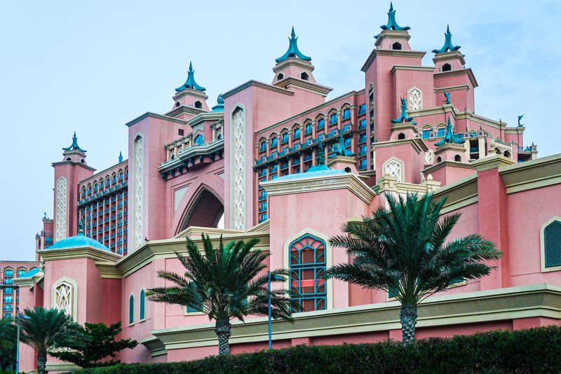 Pink Building Amidst Palm Trees, Dubai