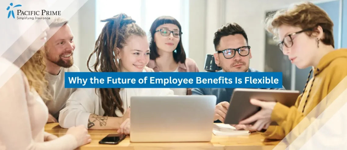 Image of Professionals Brainstorming With Laptops Around Wooden Table with text overlay of "Why the Future of Employee Benefits Is Flexible"