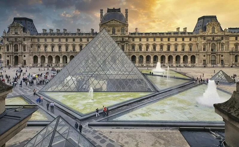 Pyramid And Fountain At Louvre, Paris