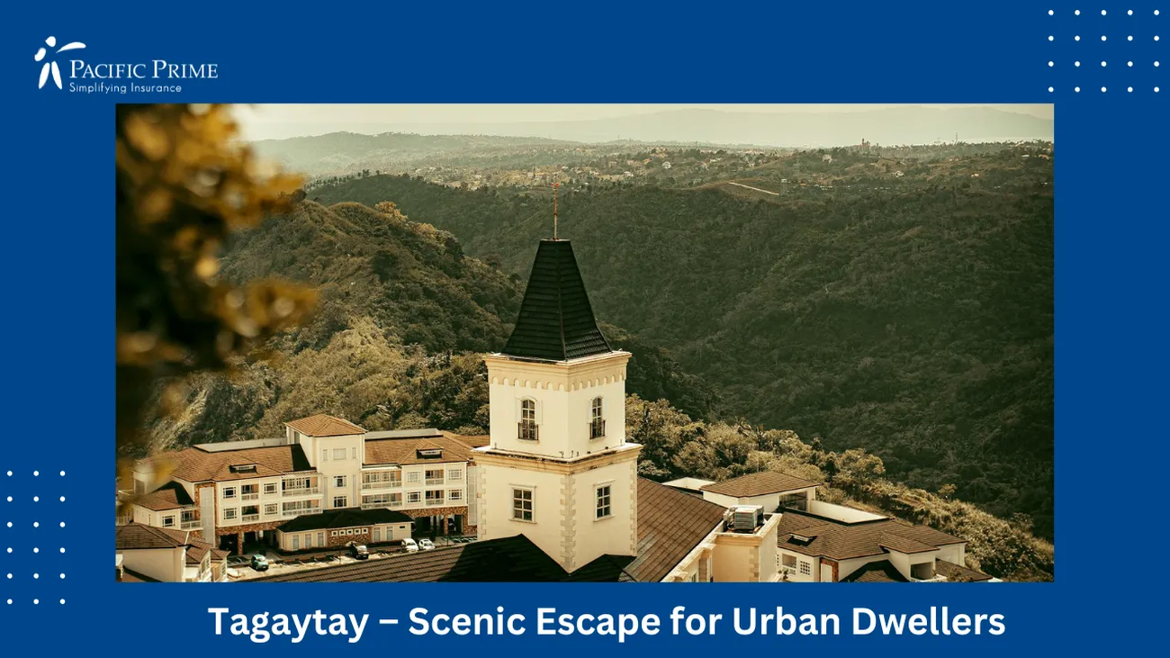 Image of Red-roofed Houses Dot Mountainous Countryside In Tagaytay, Philippines with text overlay of "Tagaytay – Scenic Escape for Urban Dwellers"