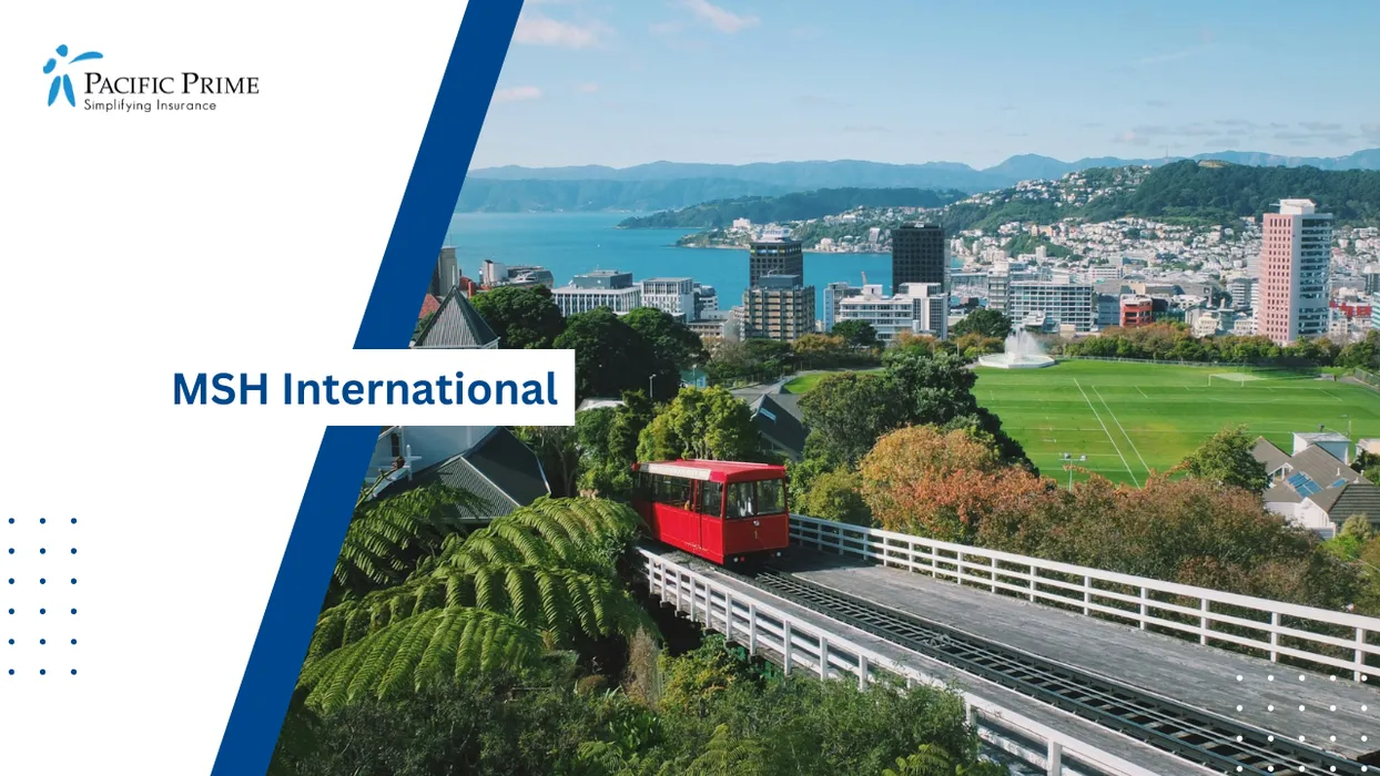Image of Red Train Passing Green Hillside Tracks In Wellington, New Zealand Scenic Route with text overlay of "MSH International"