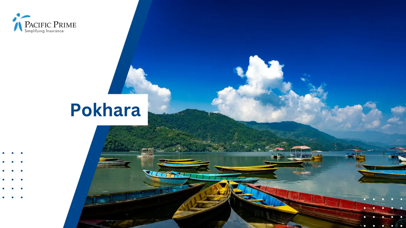 Image of Rowboat Floating On Phewa Lake In Pokhara, Nepal with text overlay of "Pokhara"