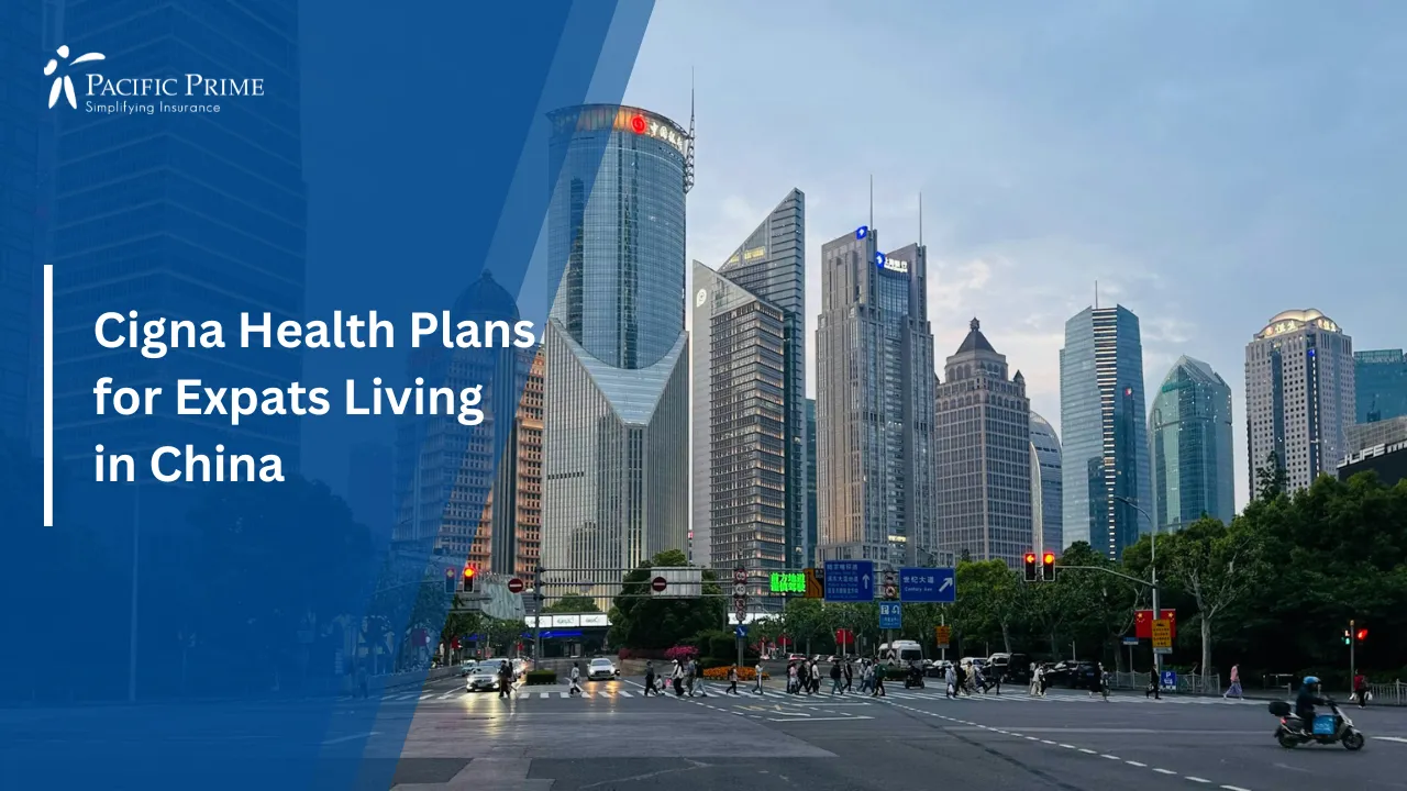 Image of Shanghai City Street With Shanghai Tower And Tall Buildings In The Background with text overlay of "Cigna Health Plans for Expats Living in China"