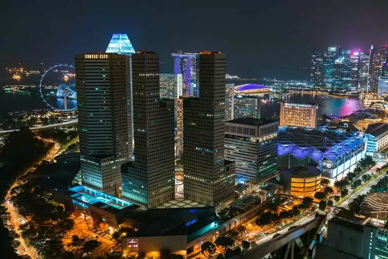 Singapore Night Skyline: Urban Landscape Shaping Immigration With COMPASS