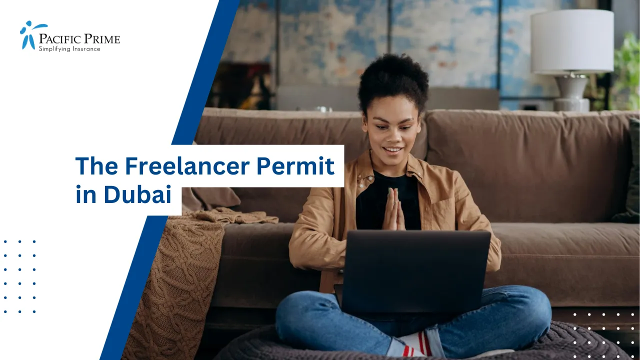 Image of Smiling Woman Using Laptop While Sitting Cross-legged In Cozy Home Setting with text overlay of "The Freelancer Permit in Dubai"