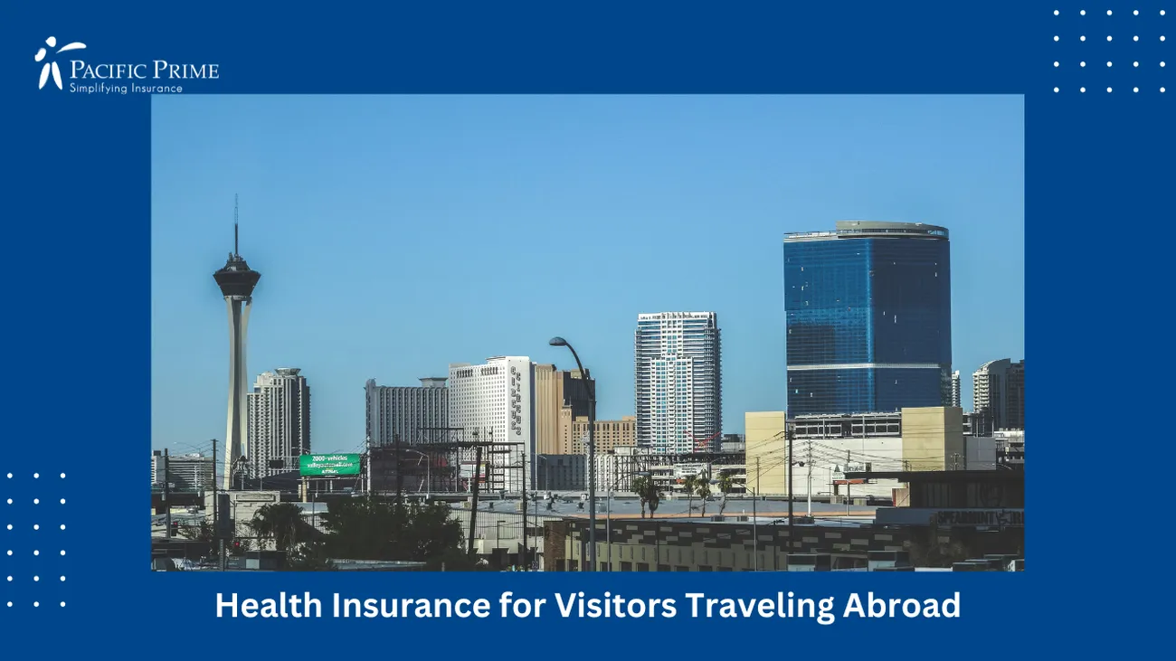 Image of Space Needle With Downtown Las Vegas Skyline In The Background with text overlay of "Health Insurance for Visitors Traveling Abroad"