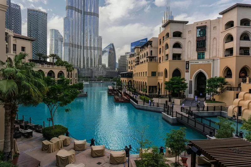 Spacious Pool Amid Dubai Skyscrapers for Relocation Salary Insight