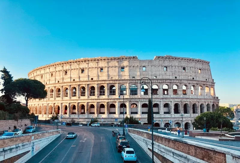 Street Parked Cars Near Rome's Colosseum