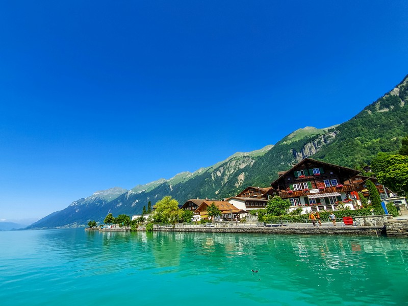 Swiss Houses By Tranquil Waters