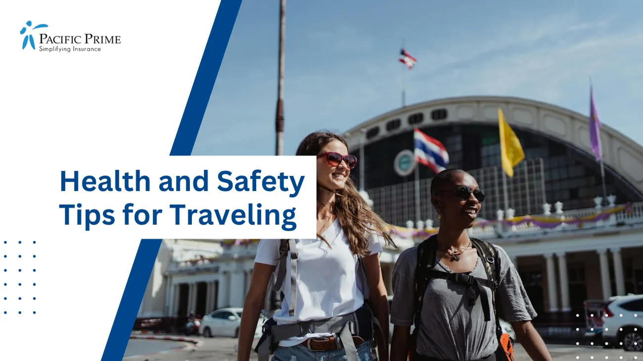 Image of Tourists Walking Past Bangkok Train Station with text overlay of "Health and Safety Tips for Traveling"
