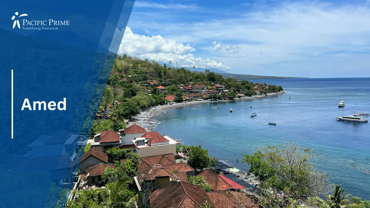 Image of Town By Amed Beach Along A Tranquil Water Body In Karangasem, Indonesia with text overlay of "Amed"