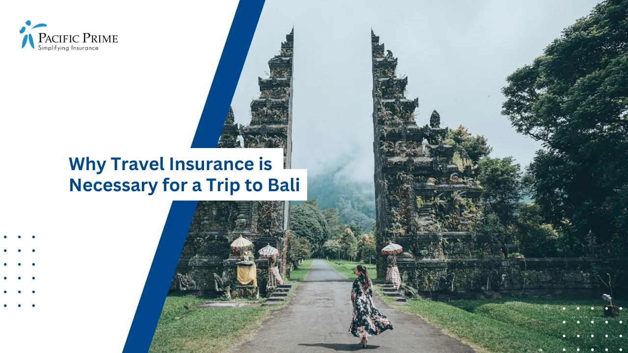 Image of Traditional Stone Temple Gate With Split Entrance In Bali, Indonesia with text overlay of "Why Travel Insurance is Necessary for a Trip to Bali"