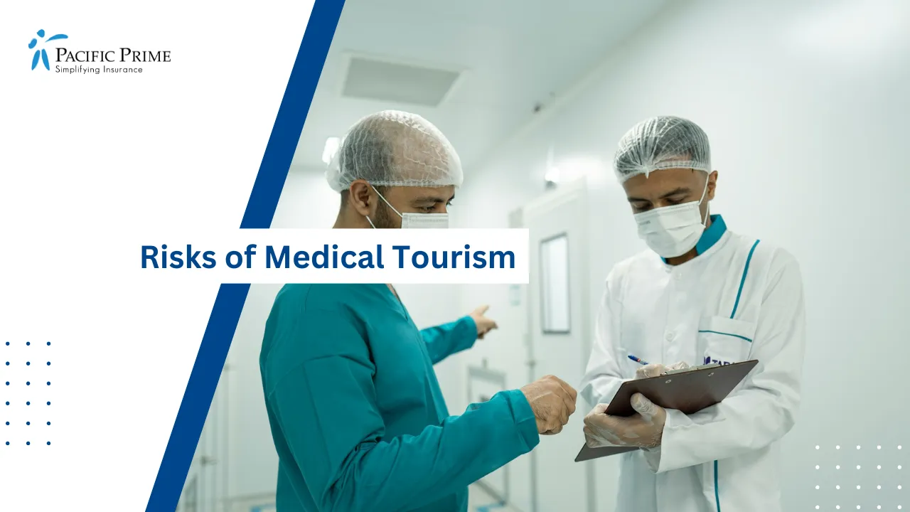 Image of Two Healthcare Specialists Discussing Patient Care In A Clinical Setting with text overlay of "Risks of Medical Tourism"
