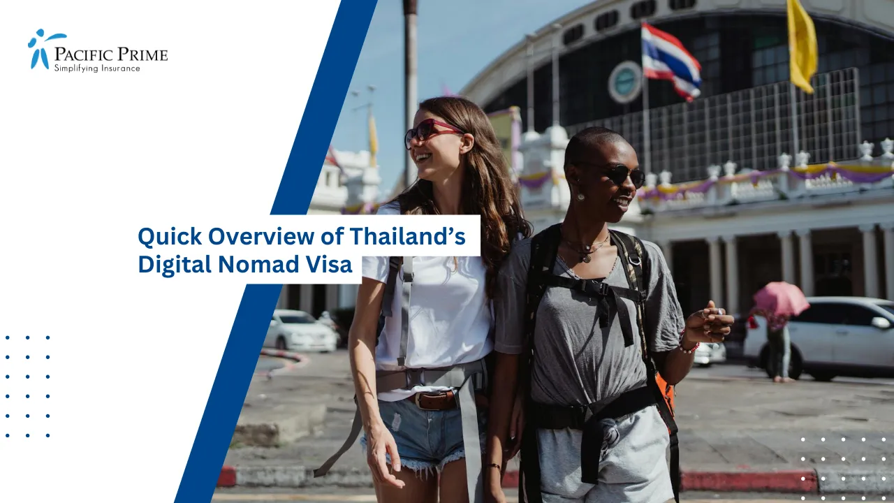 Image of Two Women Smiling Outside Bangkok Railway Station On A Sunny Day with text overlay of "Quick Overview of Thailand’s Digital Nomad Visa"