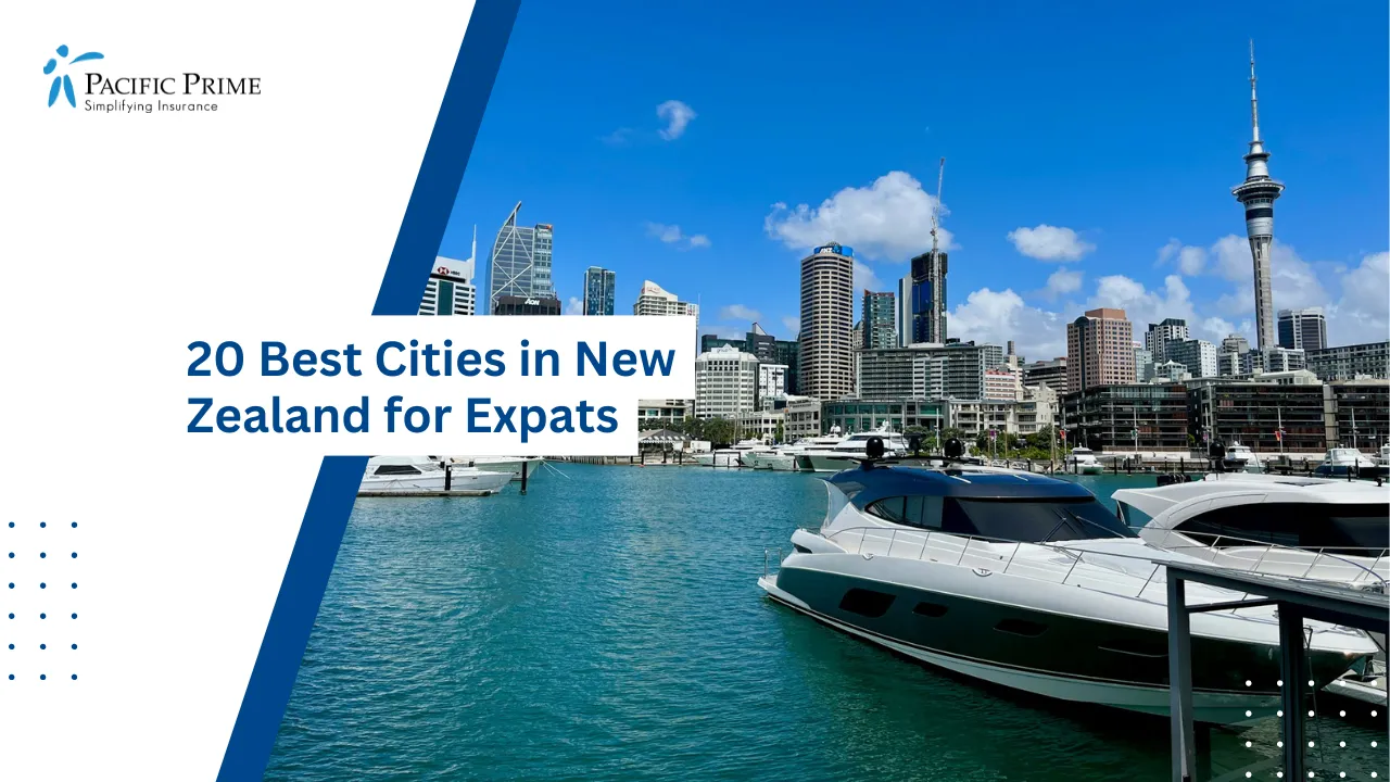 Image of Viaduct Harbour Marina With Boats And Auckland City Skyline In The Background with text overlay of "20 Best Cities in New Zealand for Expats"