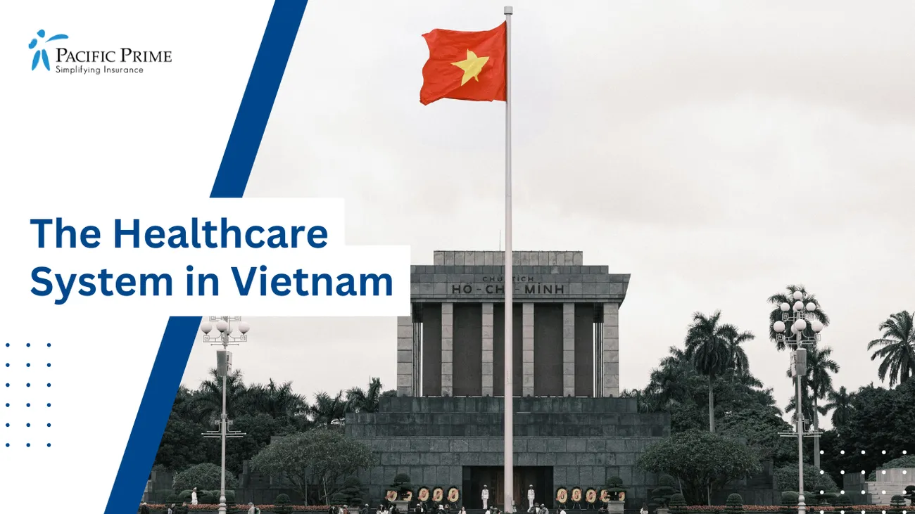 Image of Vietnamese Flag Flying In Front Of A Large Building In Vietnam with text overlay of "The Healthcare System in Vietnam"