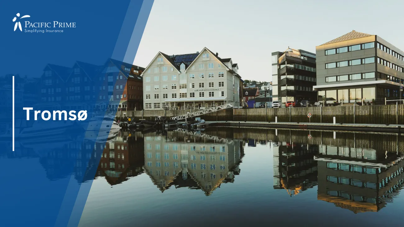Image of White And Brown Concrete Building By Water, Daytime In Tromsø, Norway with text overlay of "Tromsø"
