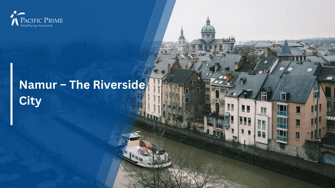 Image of White And Red Boat On Namur River By City Buildings In Daylight with text overlay of "Namur – The Riverside City"
