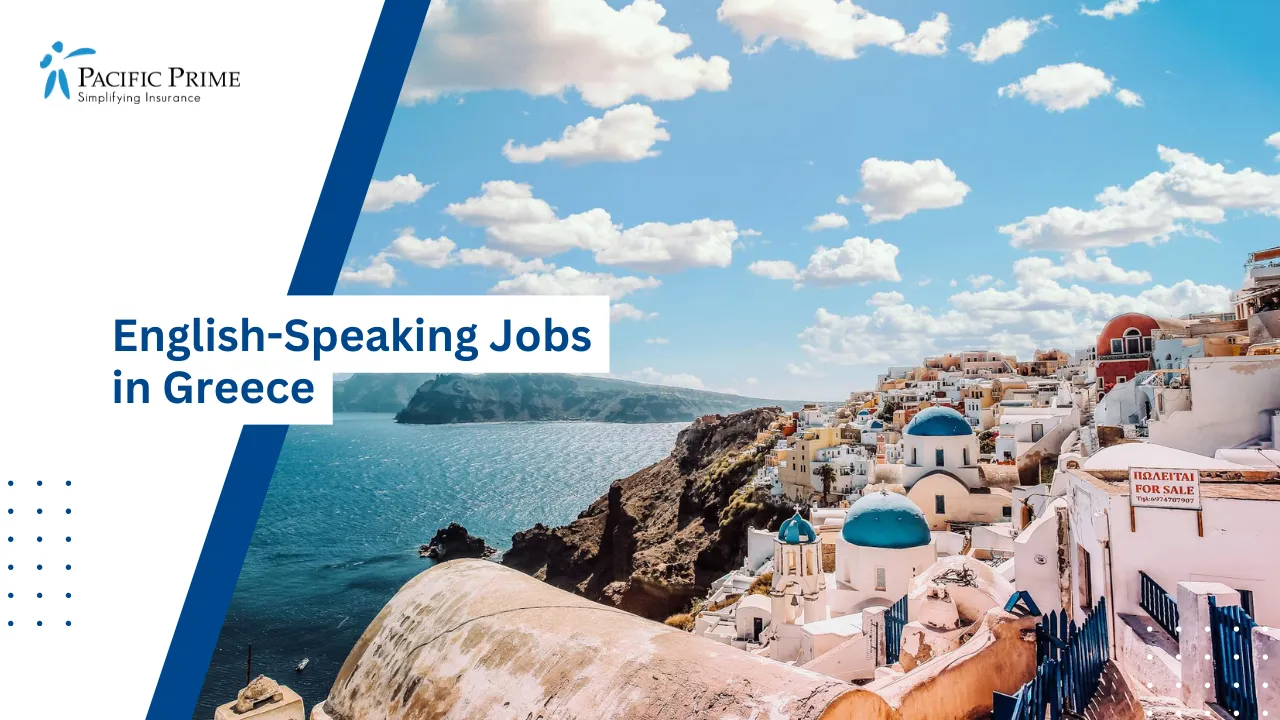 Image of White House By The Sea In Santorini Under A Blue And Cloudy Sky with text overlay of "English-Speaking Jobs in Greece"