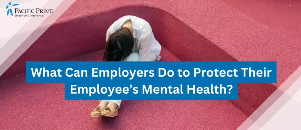 Image of Woman Sitting On The Ground With A Forlorn Expression with text overlay of "What Can Employers Do to Protect Their Employee’s Mental Health?"