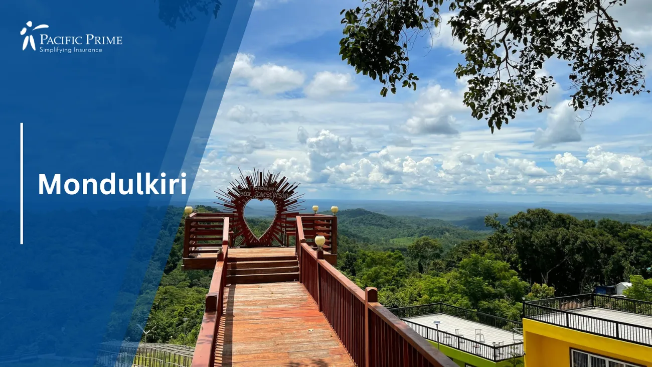 Image of Wooden Bridge Stretching Over A Lush Forest In Mondulkiri, Cambodia with text overlay of "Mondulkiri"