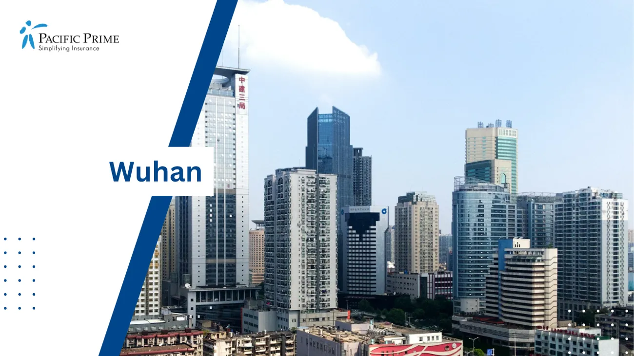 Image of Wuhan High Rises In White And Gray Under Bright Daylight with text overlay of "Wuhan"