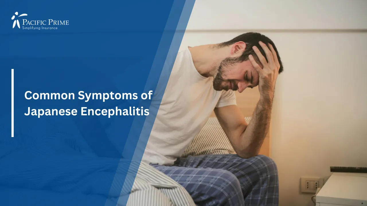 Image of Young Man In Sleepwear Holding Head With Morning Headache with text overlay of "Common Symptoms of Japanese Encephalitis"
