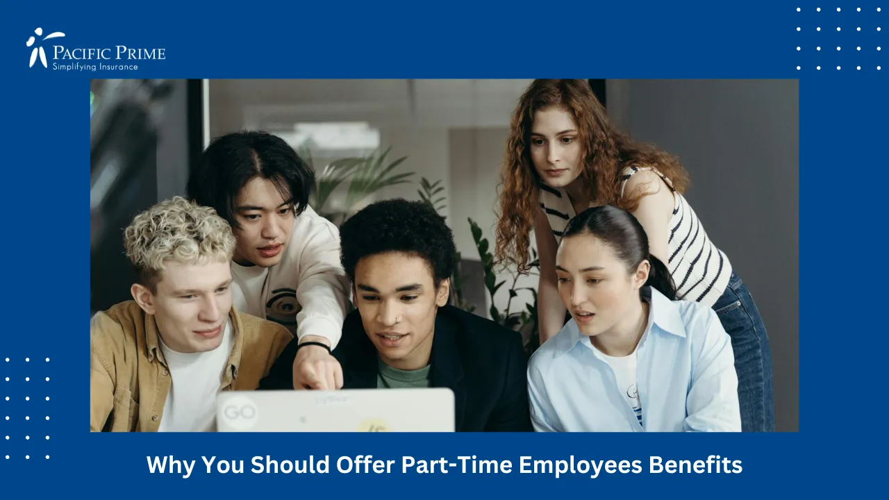 Image of Young Professionals Collaborating On Laptop In Modern Office Setting with text overlay of "Why You Should Offer Part-Time Employees Benefits"