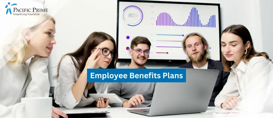 Image of Young Professionals Working Together In A Modern Office Setting with text overlay of "Employee Benefits Plans"